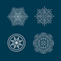 set of round calligraphic patterns or snowflakes vector