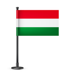 Realistic hungarian table flag on a black steel vector