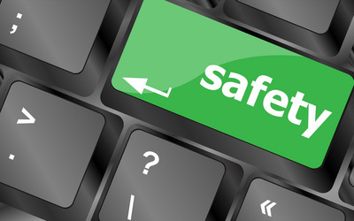 Safety first concept with key on computer keyboard vector