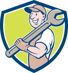 mechanic smiling spanner standing crest cartoon Vector Image