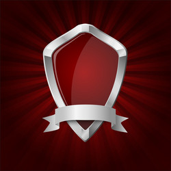 Glossy shield on red rays background vector