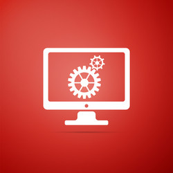 Monitor and gears icon isolated on red background vector