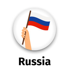 russian flag in hand round icon vector