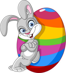 Cute little bunny holding decorated easter egg Vector Image