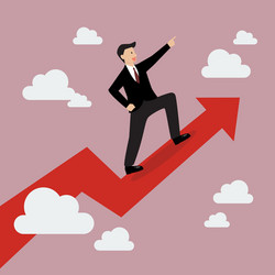 businessman standing on a growing graph vector