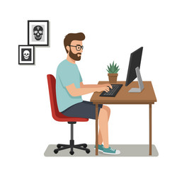 man working on computer at desk in home office vector image