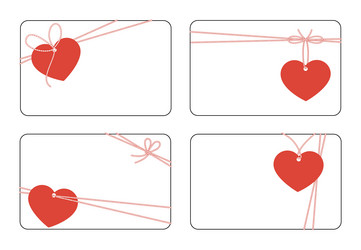 set of blank cards with heart shape tags and rope