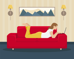 Girl works at the laptop lying on couch vector