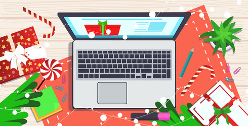 Laptop on workplace desk christmas holidays vector