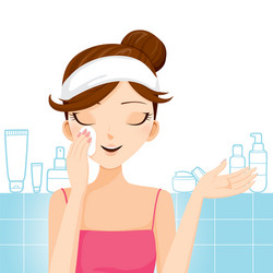 Young woman cleaning makeup on her face vector