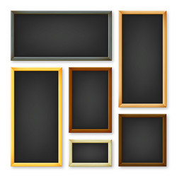 Realistic various chalkboards in a wooden frame vector