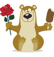 Smiling bear with red rose vector image