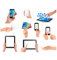 Set of hands holding different business objects vector image