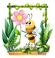 A bee holding a pink flower vector image