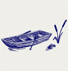 Wooden boat with paddles vector image