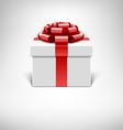 White gift box with red ribbon vector image