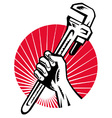 Plumber hand holding monkey vector image