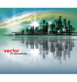City skyline at night with reflection in water vector image