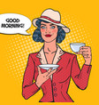 Beautiful woman drinking morning tea in cafe vector image