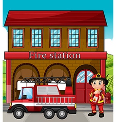 A fireman with a fire truck in a fire station vector image