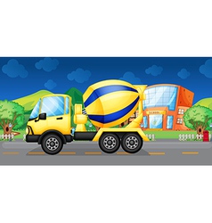 A cement truck running in the street vector image