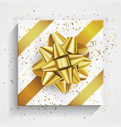 White gift box - gold christmas and birthday bow White gift box - gold christmas and birthday bow vector image