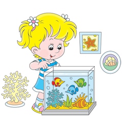 Girl looking at aquarium fishes vector image