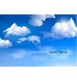 Blue sky with clouds background vector image
