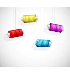 Bobbins of colorful thread vector image