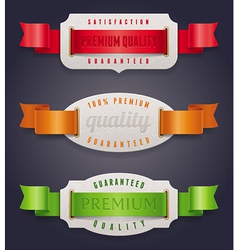 Labels of quality with color ribbon vector image