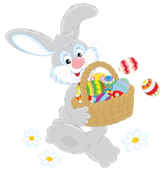Easter Bunny with a basket of eggs vector image
