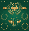 Anniversary golden emblems and decorative elements vector image