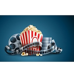 Movie film reel and popcorn vector image