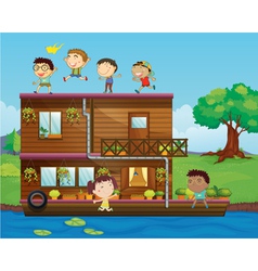 Kids playing near a houseboat vector image