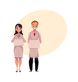 Male and female doctors in medical coat holding vector image