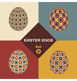 Set of 4 geometrical patterned eggs Set of 4 geometrical patterned eggs vector image