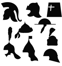 A set of silhouettes of medieval military helmets vector image