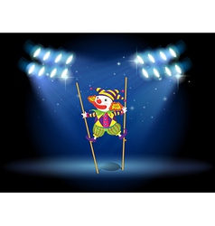 A clown doing a trick at the stage vector image