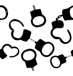 Seamless pattern of handcuffs silhouettes on vector image