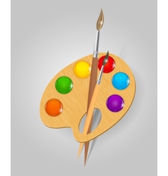 Wooden art palette with paints and brushe vector image