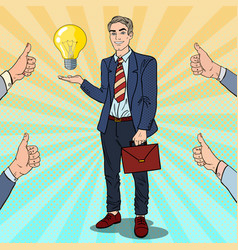 Pop art businessman with creative idea light bulb vector image