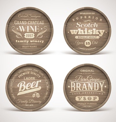 Wooden casks with alcohol drinks emblems vector image