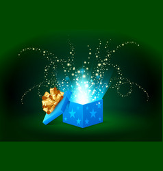 Beautiful magic light shining from a blue gift box vector image