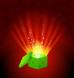 Beautiful magic light shining from a green gift vector image