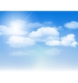 Blue sky with clouds and sun vector image
