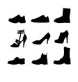 Nine shoes silhouettes vector image