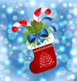 Christmas sock with sweet canes vector image