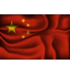 Crumpled flag of China on a light background vector image