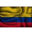 Crumpled flag of Colombia a light background vector image