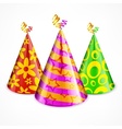 Three party hats on white vector image